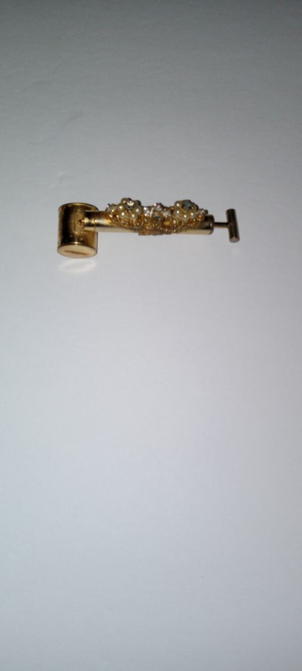 Vintage prefume hand pump.
